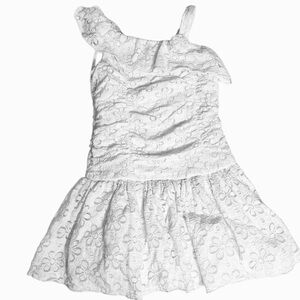 Girls white lace dress with asymmetrical neckline with flower pattern